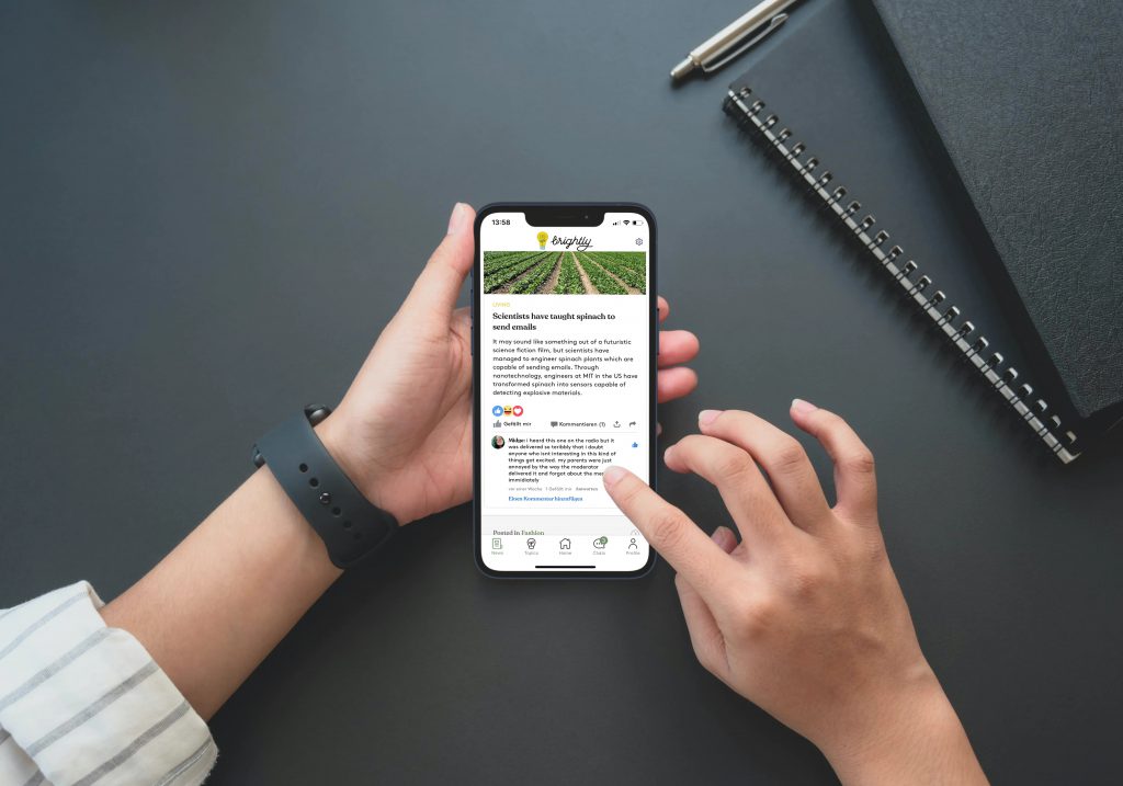 User holding iPhone